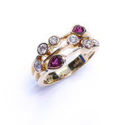 3 strand dress ring pear cut ruby and diamond