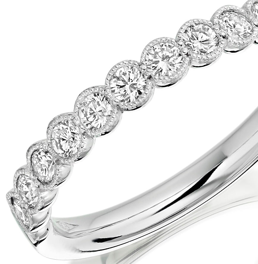18ct white gold millgrain edge diamond half eternity ring close up