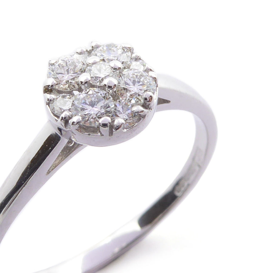 18ct white gold halo diamond engagement ring close up