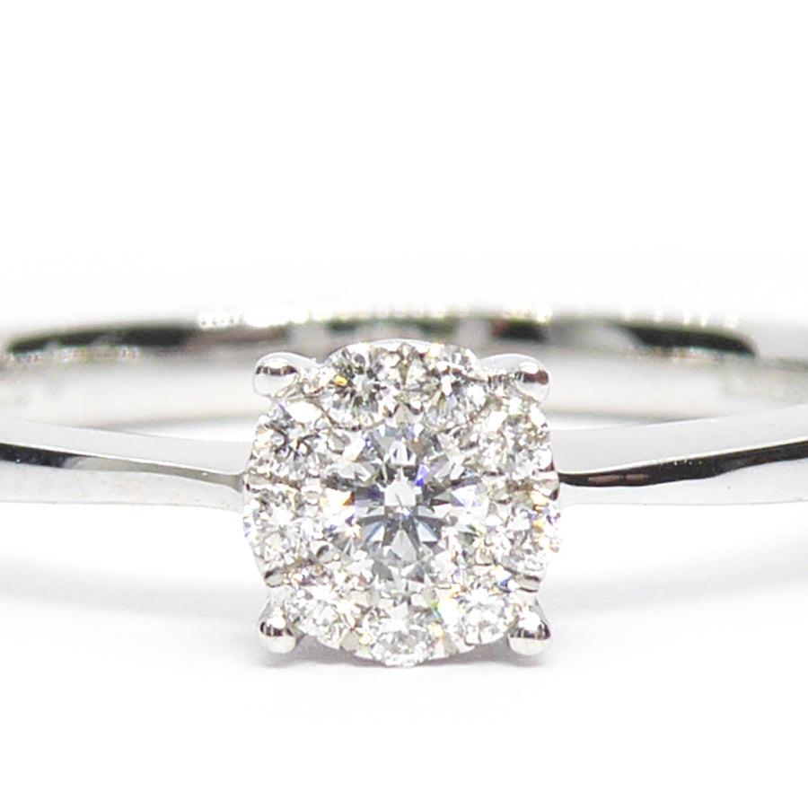 18ct white gold halo diamond engagement ring close up